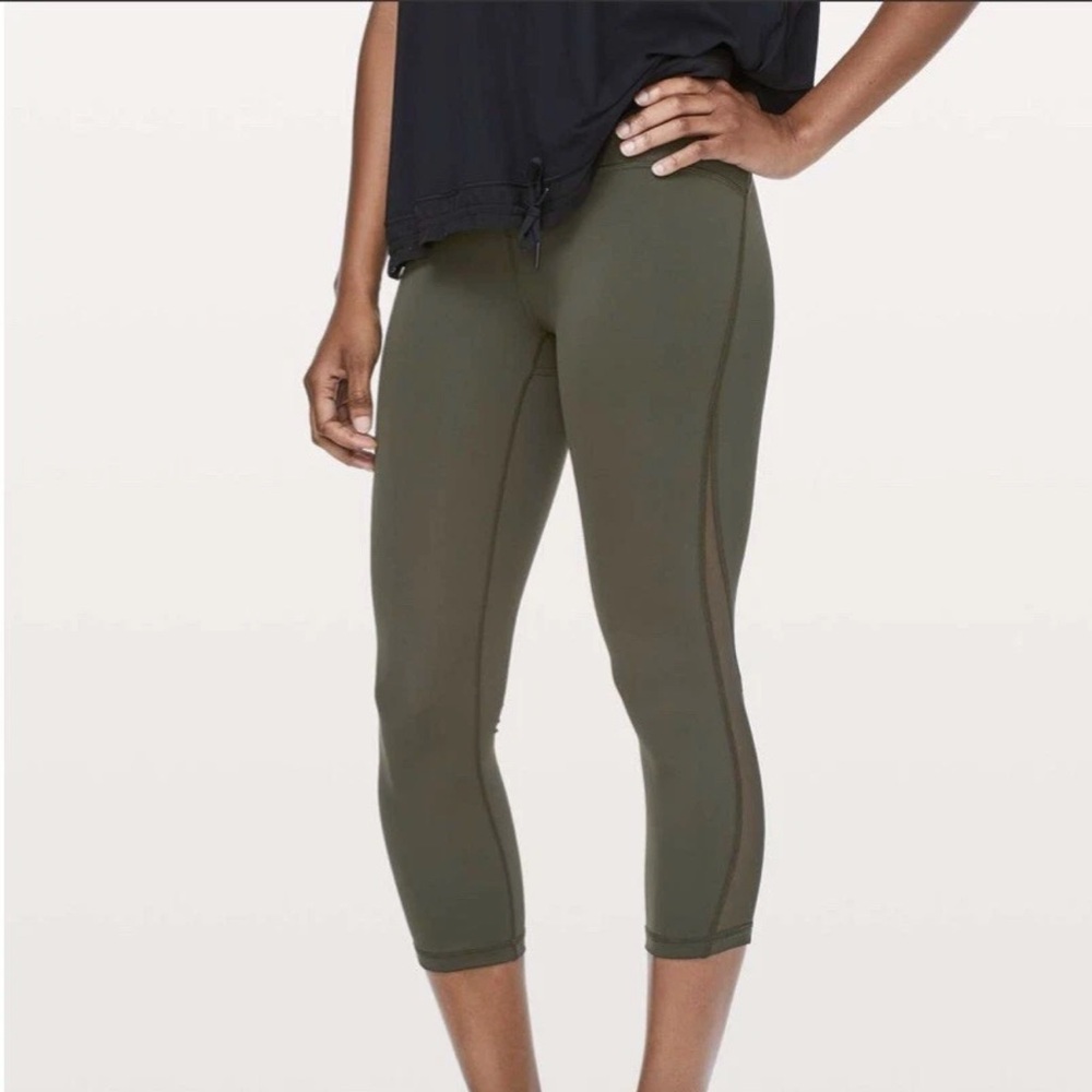 Lululemon women's olive green side mesh criss cross leggings 21" inseam size 4